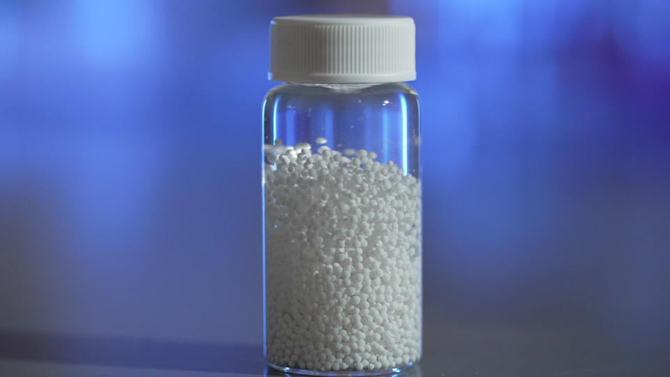 A bottle of the IL-2 producing beads.