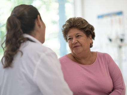 Older woman talking with her doctor
